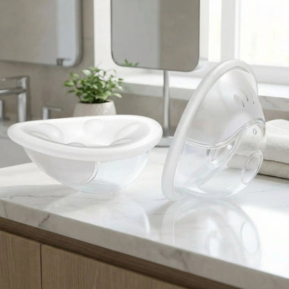 Coquille allaitement Maternis sur comptoir salle de bain