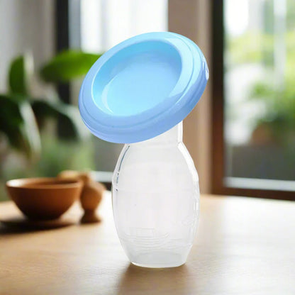 Tire Lait - mammaflow bleu sur une table